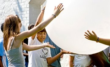 Students holding weather balloon