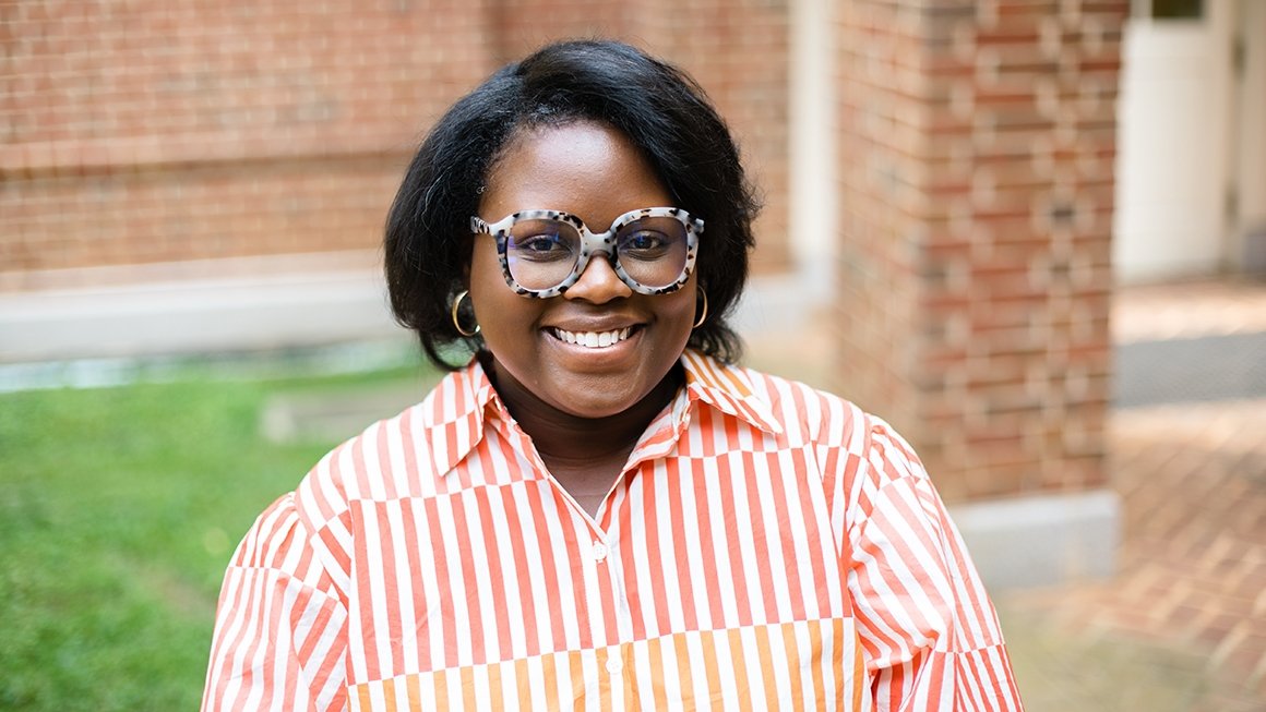 Wintre Foxworth Johnson smiling at camera standing outdoors