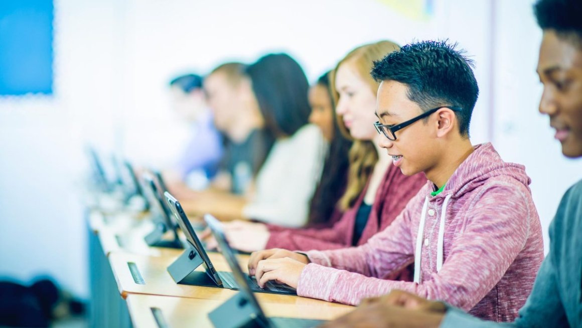 Adolescents using tablets