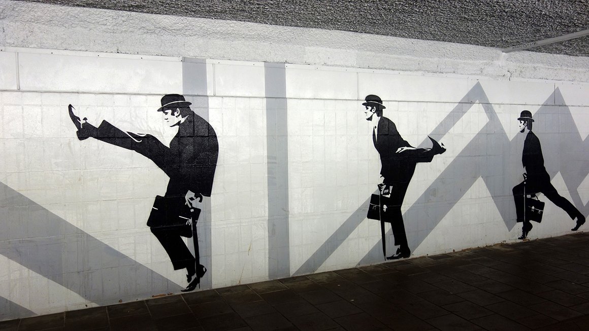 Wall mural illustrating Monty Python's silly walks