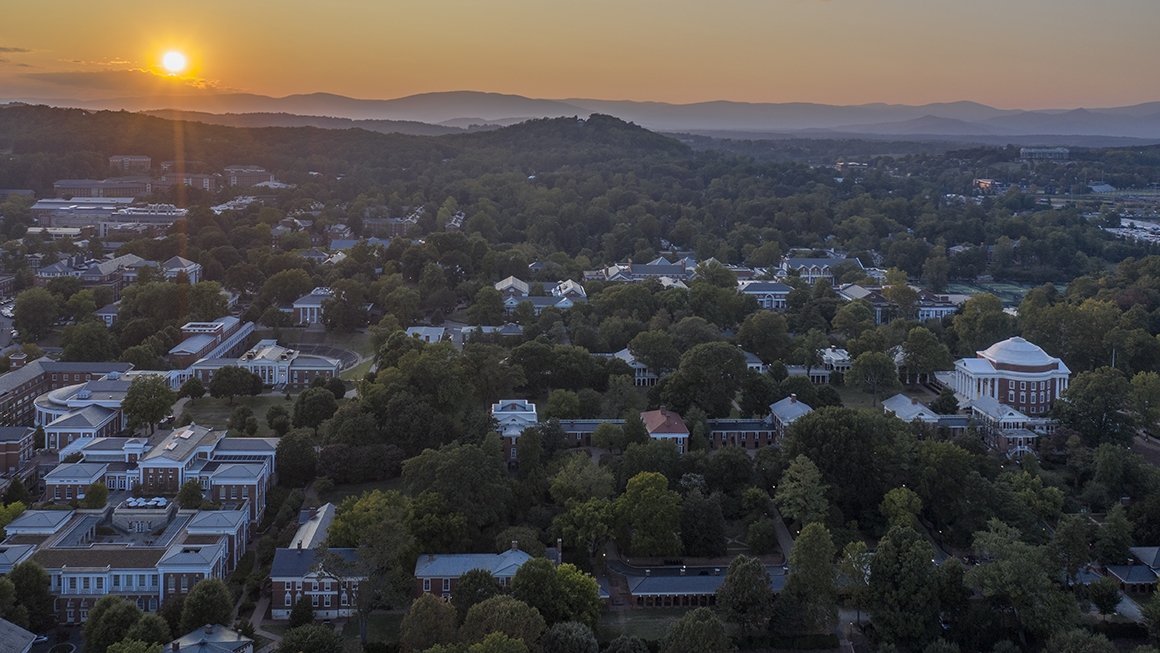 Aerial view of the University of Virginia and Charlottesville at sunset.