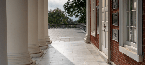 An exterior shot of a UVA building with stone columns