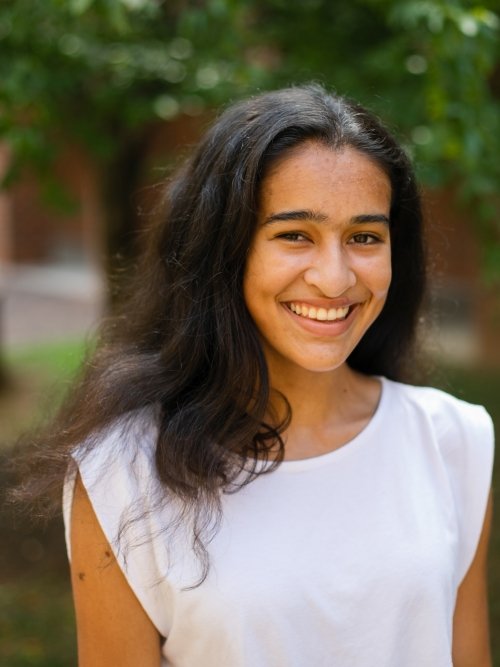Talyn Steinmann photographed outside wearing a white shirt