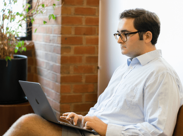 A student working on a laptop computer