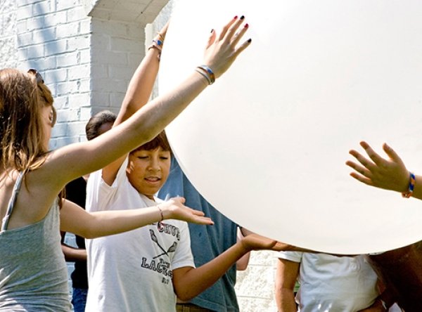 sep_checkerboard_2022-11-28.jpg Students holding weather balloon
