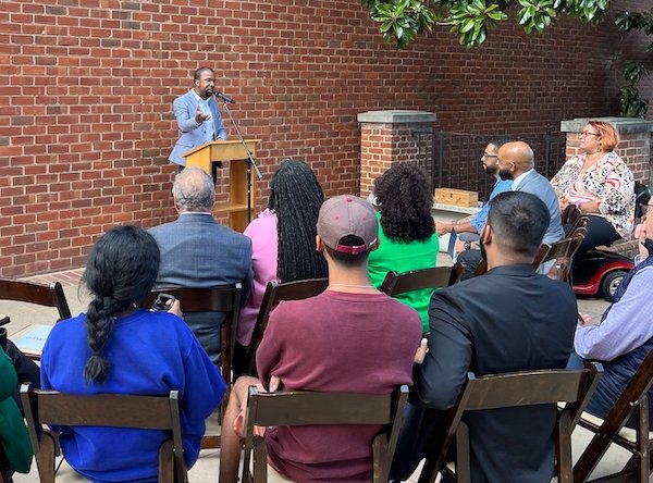 LaRon Scott speaking outdoors at the Hunter Bench Dedication ceremony