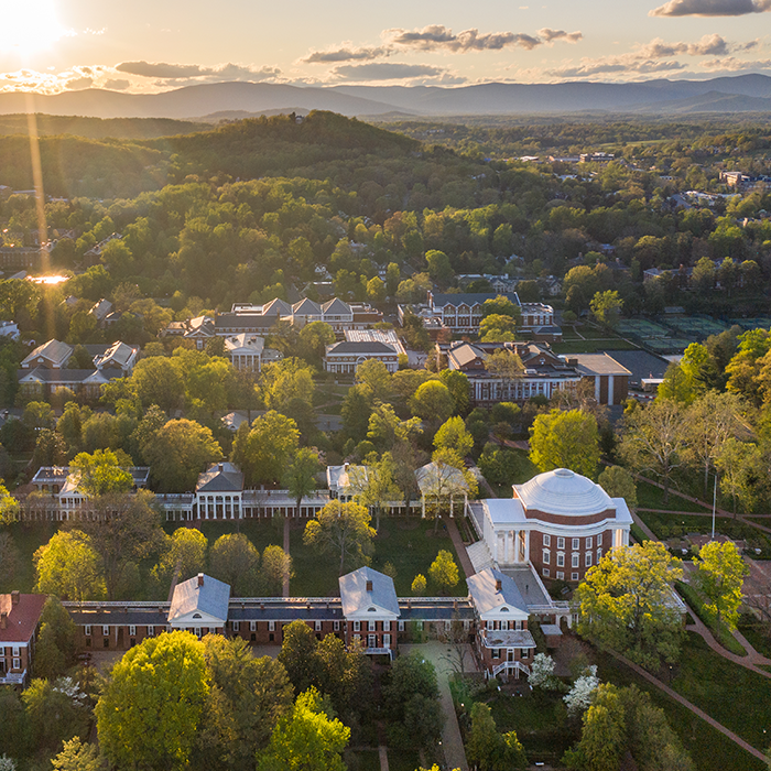 An aerial view of the UVA Rotunda and Grounds at sunrise