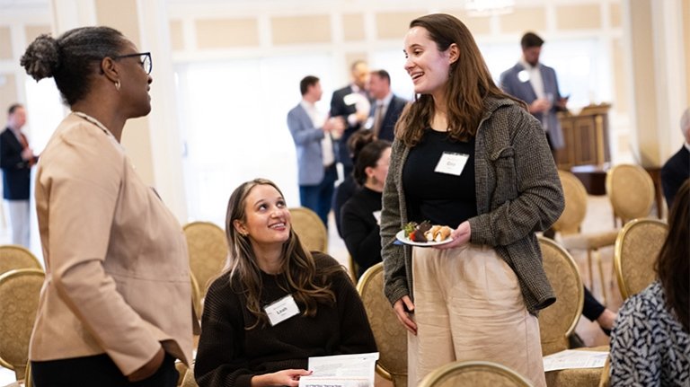 Dean Stephanie Rowley speaks to attendees at an event